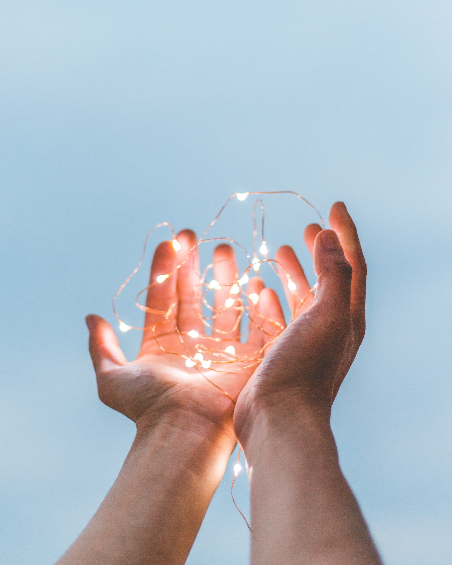 fairy lights in hands